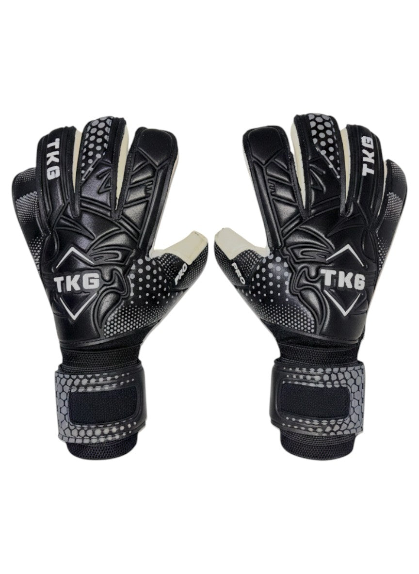 TOTAL KEEPERS GOTI PRO black latex goalkeeper gloves with roll negative cut and reinforced finger spines.