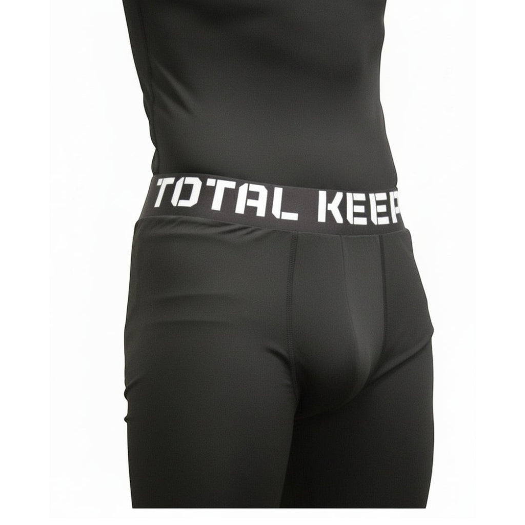 TOTAL KEEPERS black compression tights with TKG logo on thigh, ideal for high-intensity training.