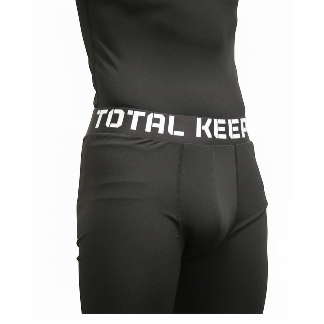 TOTAL KEEPERS black compression tights with TKG logo on thigh, ideal for high-intensity training.